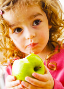 girl eating an apple