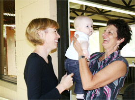 Eliza and her mother being welcomed by Susan.