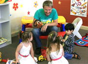 group of children of varying ages playing at a childcare centre