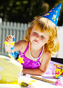 Child with birthday cake