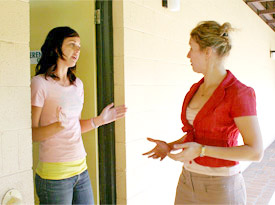 Owen’s mother talking with Salwa. Nicole is sitting on the floor in the background.