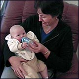 bottle feeding a baby.