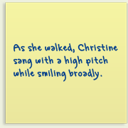 Piece of paper with writing on it saying, 'As she walked, Christine sang with a high pitch while smiling broadly'.