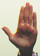 a hand signalling stop.